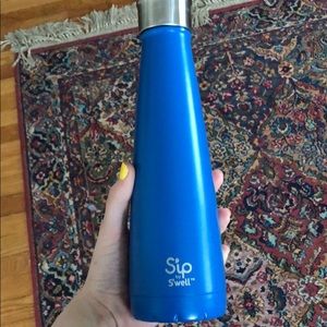 dark blue sip by swell water bottle. NEVER USED!!!